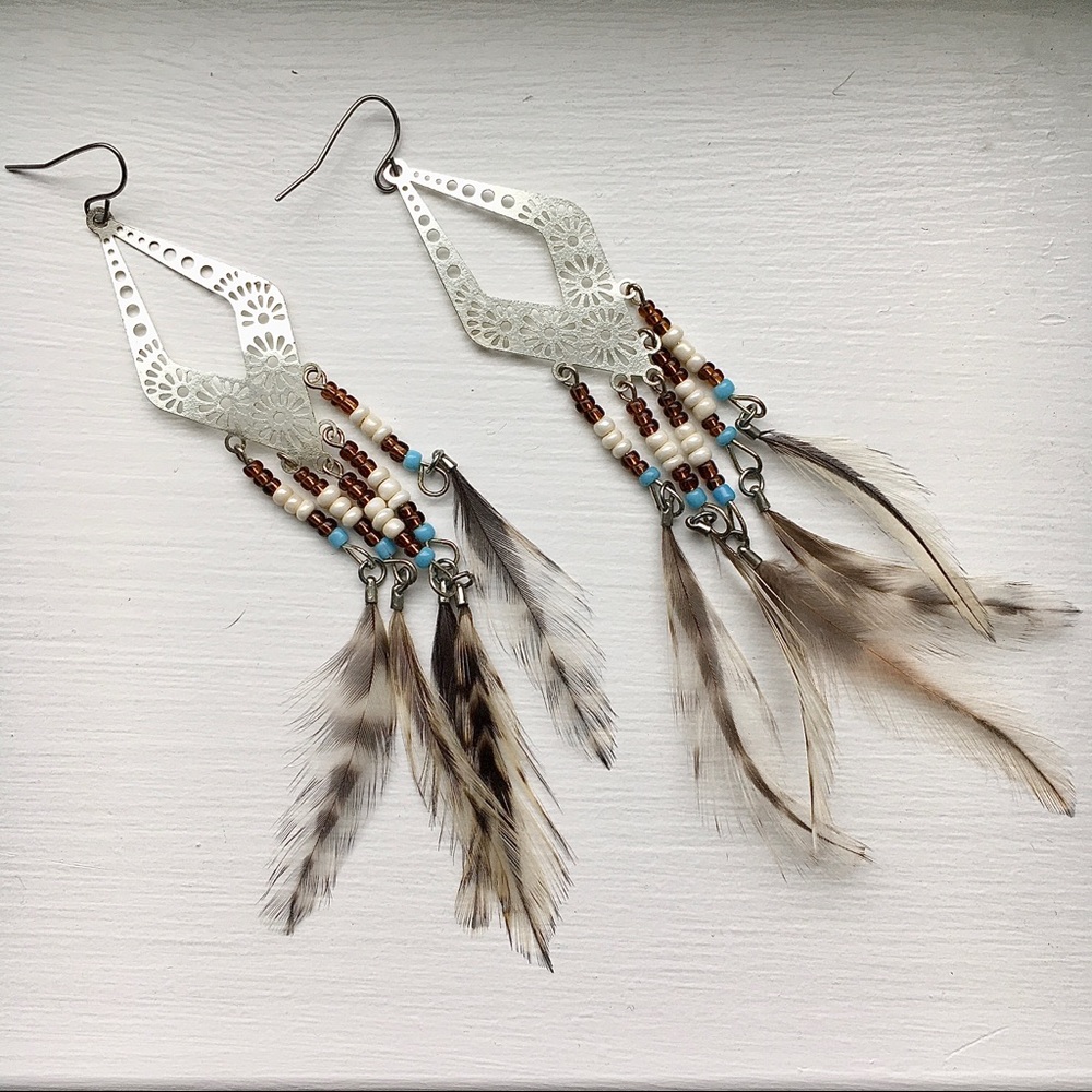 3/$15! Metal and feather dangle earrings